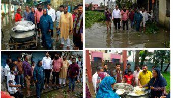 বন্যা কবলিত এলাকায় রান্না করা খাবার ও শুকনো খাবার বিতরন